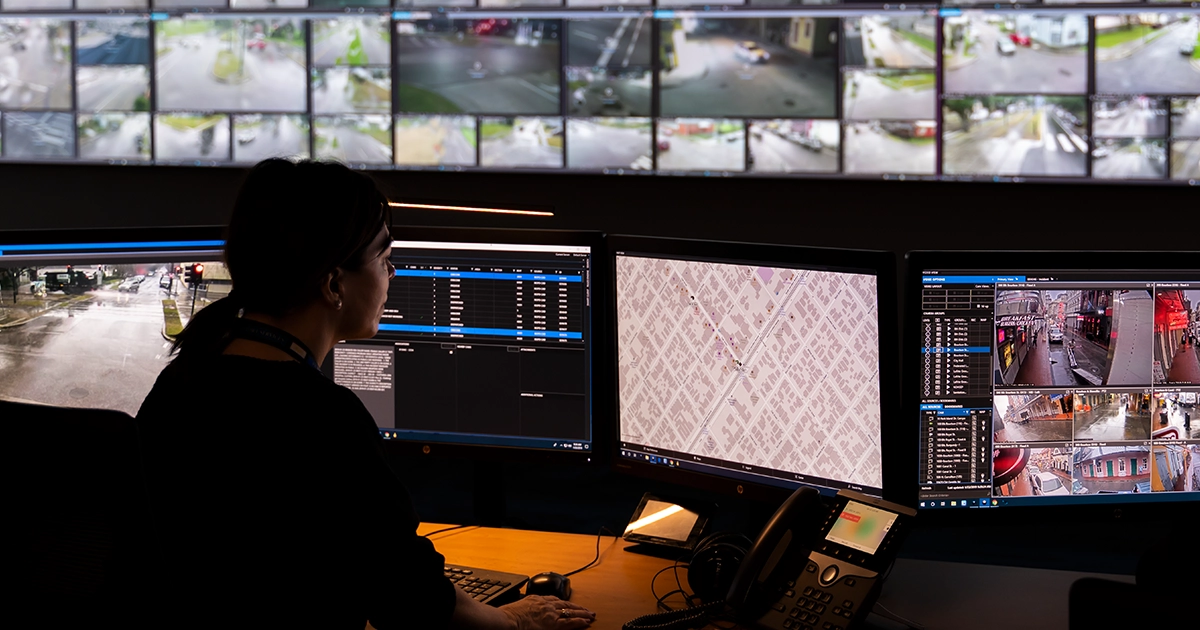 Australian corrections officer monitors a control room solution at an Australian prison