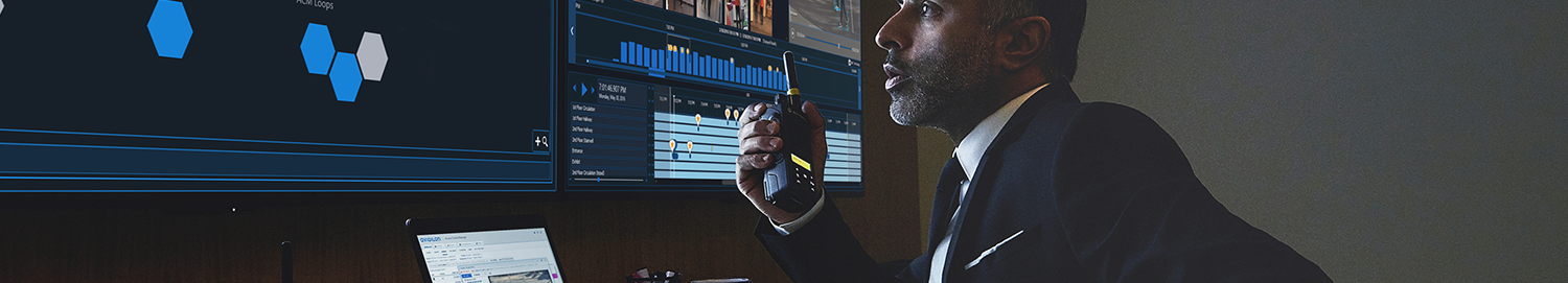 Employee monitors activity using a CSE Crosscom control room solution.