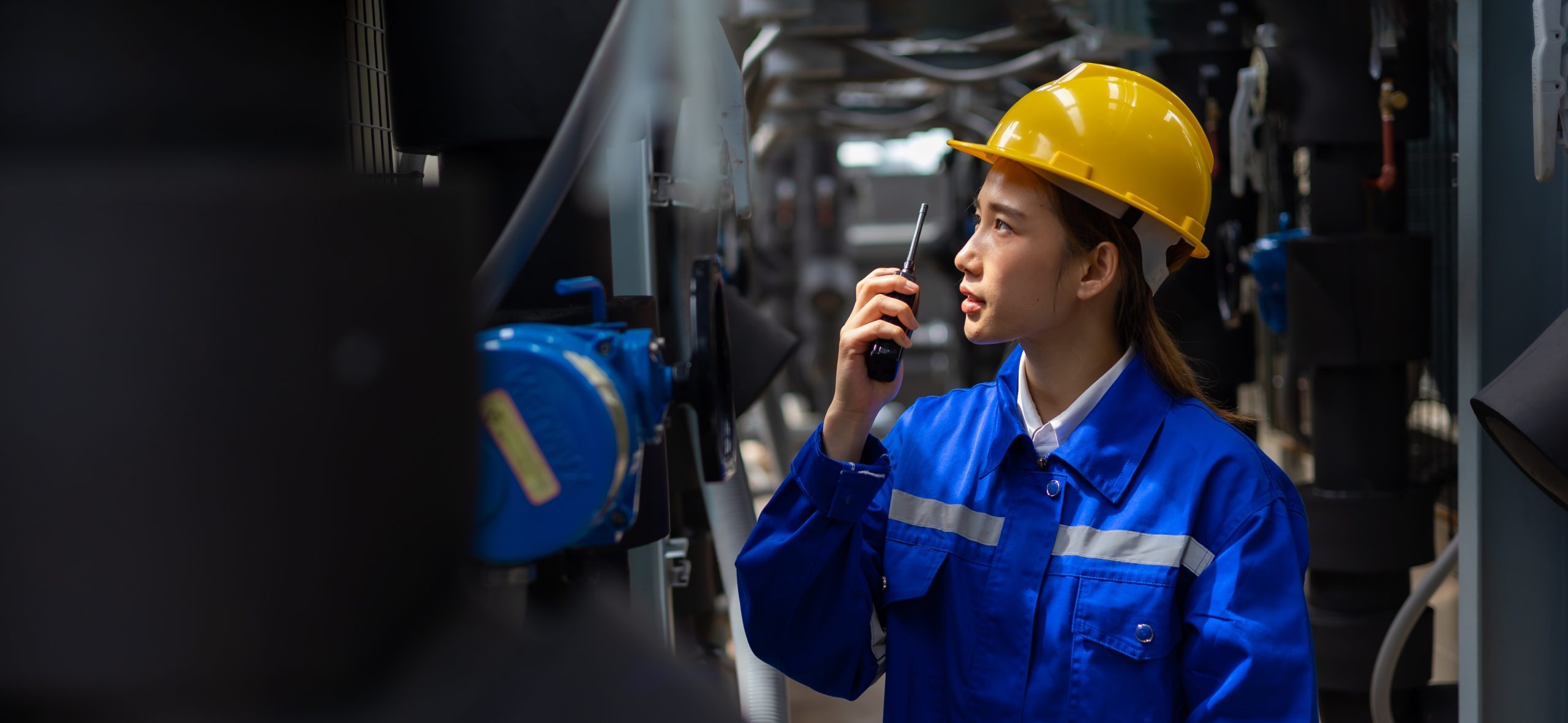 Engineer using two-way radio